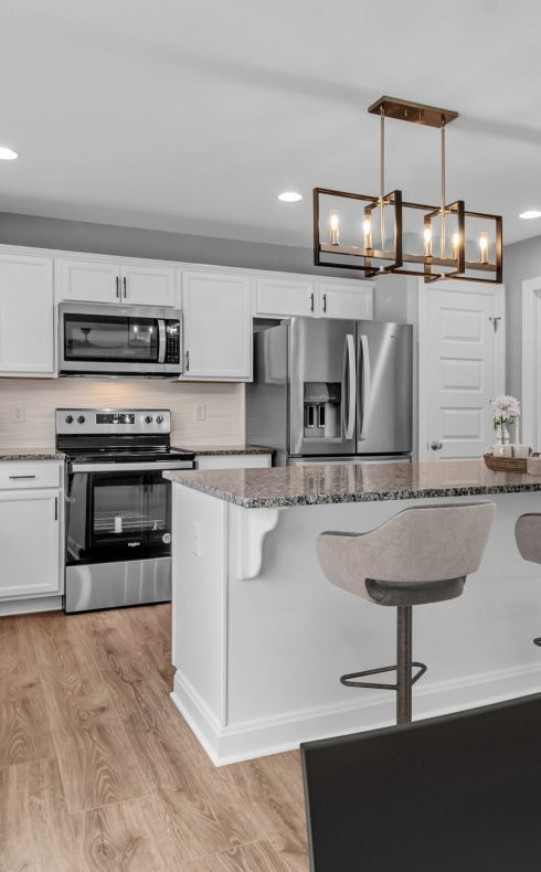 6283fb4a0cf0d2cbf26ea862_Bartlett - Kitchen - Staged